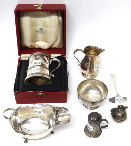 Silver, comprising; a christening mug with a case, a cream jug, with a matching sugar bowl, Birmingham 1968, a sauceboat, a pepper can, a miniature Je