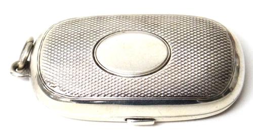 A late Victorian silver twin compartment sovereign cum half sovereign case, the exterior engine turned and with a vacant oval cartouche, Birmingham 18