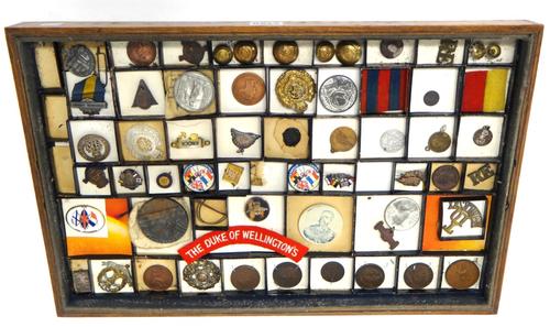 A collection of militaria, medallions and coins and further items, including; a medallion commemorating the sinking of The Lusitania, a First World Wa