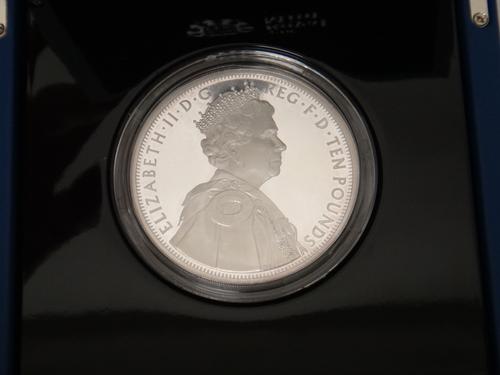 A quantity of modern proof and other commemorative coins and medallions to include; a ten pound coin 2012, commemorating The Queen's Diamond Jubilee,