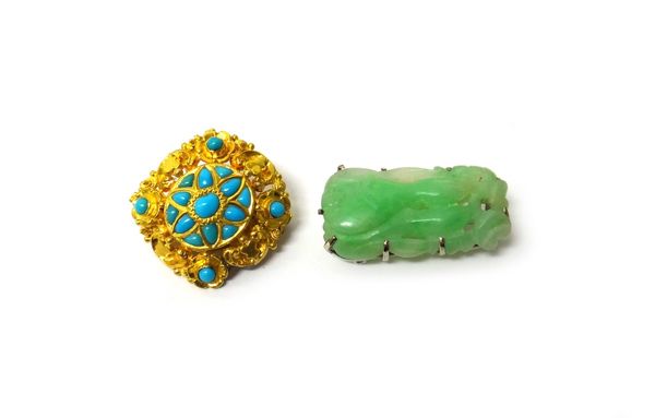 A carved jade brooch, decorated and pierced with a fruit motif and a gold and turquoise set brooch, probably Indian, mid 19th century, (2).