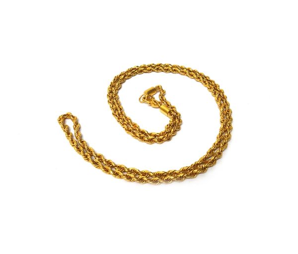 An Oriental gold ropetwist link neckchain, on a serpentine clasp, weight 29.7 gms.