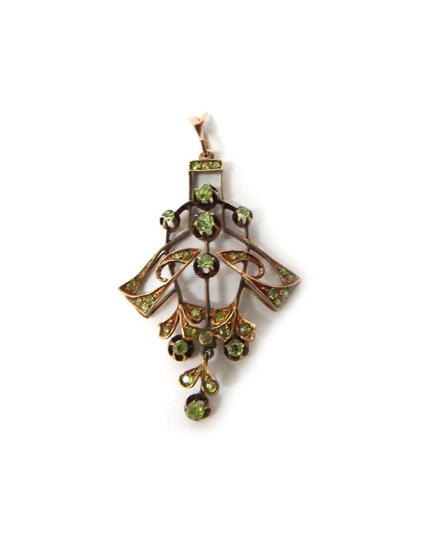 A Russian gold and demantoid garnet pendant, in an openwork Art Nouveau pierced scroll design, detailed AM 56.