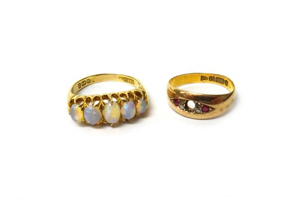 A late Victorian 18ct gold and opal set five stone ring, Birmingham 1899, ring size P and a half and a Victorian 15ct gold ring, mounted with two rose