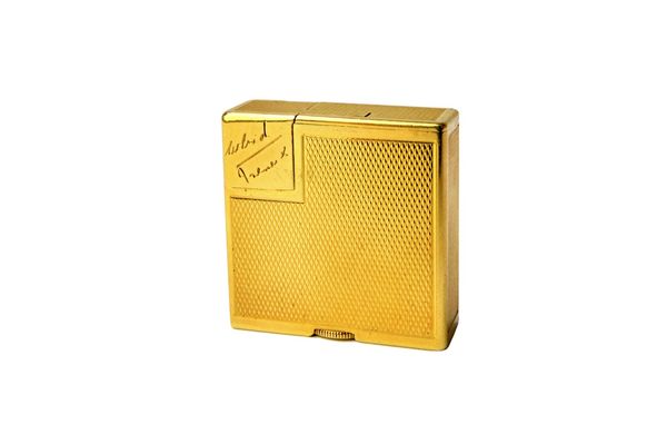 A Dunhill 18ct gold square petrol lighter, with engine turned decoration, detailed Dunhill London, Made in Switzerland, import mark London 1938, gross