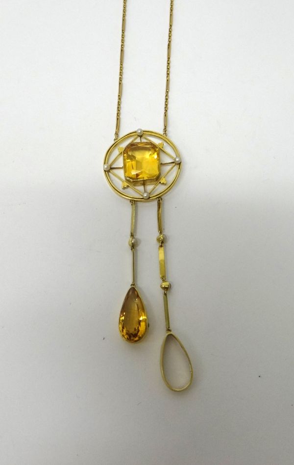 A gold, citrine and seed pearl necklace, mounted with a cut cornered rectangular cut citrine, in an openwork surround mounted with four seed pearls at