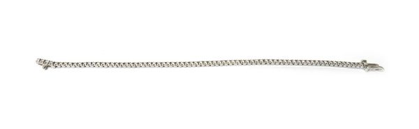 A white gold and diamond bracelet, mounted with a row of circular cut diamonds, on a foldover clasp, detailed 18 K, length 17.5cm.