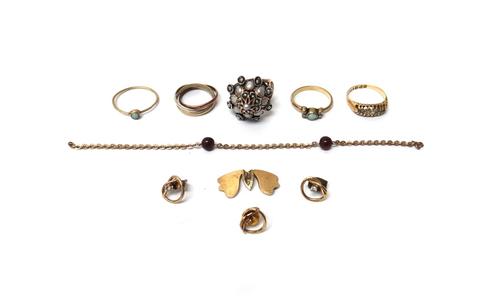 A group of mostly gold jewellery, comprising; a 9ct three colour gold Russian style wedding ring, an 18ct gold and colourless gem set five stone ring,
