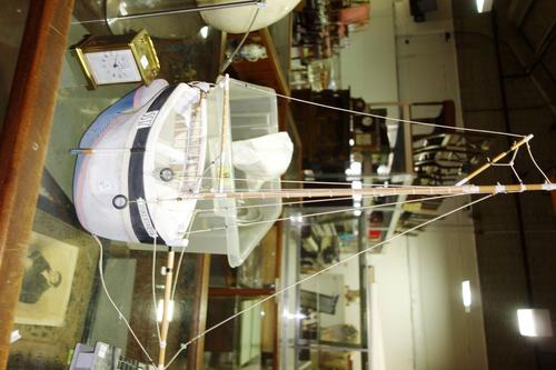 After Alfred Wallace; A wall mounted boat display together with a hand painted drift wood wall mounted boat sculpture. S3B