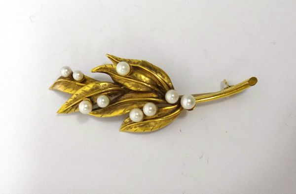 A 9ct gold and cultured pearl brooch, designed as a foliate spray, Birmingham 1924.