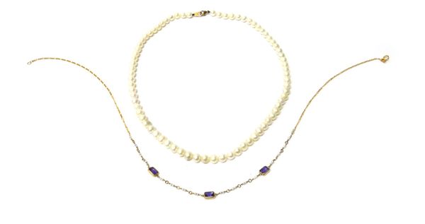 A 9ct gold, amethyst and seed pearl necklace, the front mounted with three rectangular cut amethysts and with rows of pairs of seed pearls spaced at i