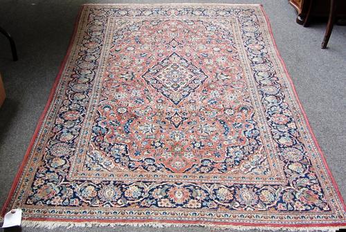 A pair of sapphire and diamond night and day pendant earrings, each with a seven stone cluster to the top and with two sapphire and diamond detachable