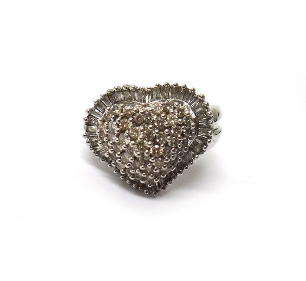 A 14ct white gold and diamond ring, in a heart shaped cluster design, pave set with circular cut diamonds to the heart and with a border of baguette d