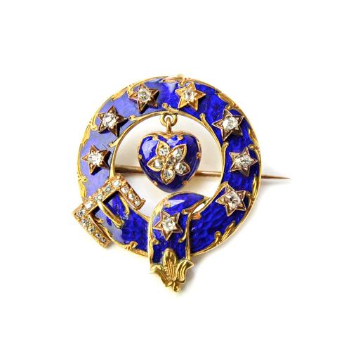 A Victorian gold, diamond set and blue enamelled brooch, designed as a buckle and strap garter motif and with a heart shaped locket backed pendant, fi