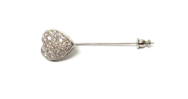 A diamond set stickpin designed as a heart shaped cluster, mounted with circular cut diamonds.