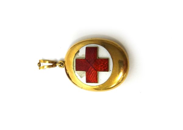 A Russian gold and enamelled oval pendant locket, the front applied with a red enamelled cross, on a circular white enamelled ground, the suspension l