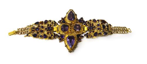 A foil backed amethyst set bracelet, mounted with variously cut stones, composite, (one amethyst lacking), length 16cm.