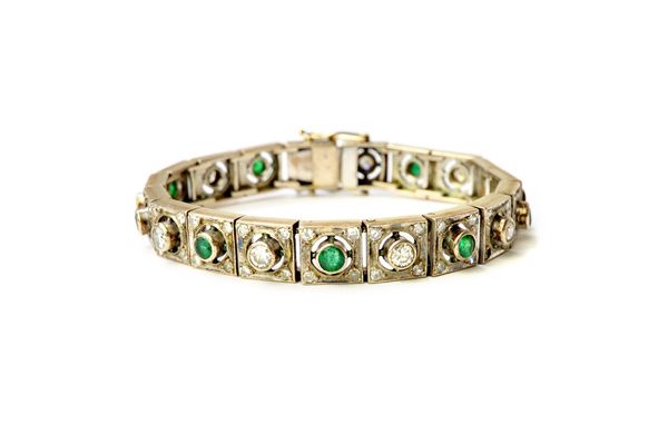 A diamond and emerald bracelet, formed as a row of square links, each mounted with an alternating circular cut diamond and a circular cut emerald to t