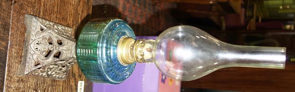 A 20th century gilt metal and blue glass oil lamp.   S3T