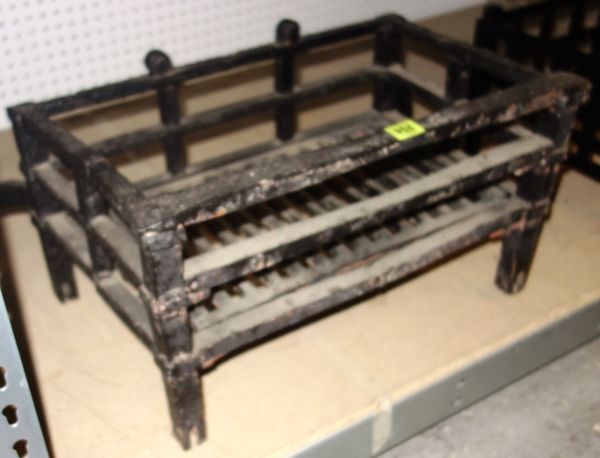 A wrought iron fire basket.   S1B