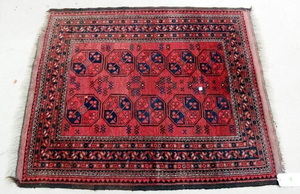 An Afghan rug, 132cm x 107cm.Property from the estates of the late Adrian Stanford and Norman St John-Stevas, Baron St John of FawsleyD7