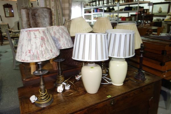 A quantity of 20th century table lamps and shades. (8)  H5