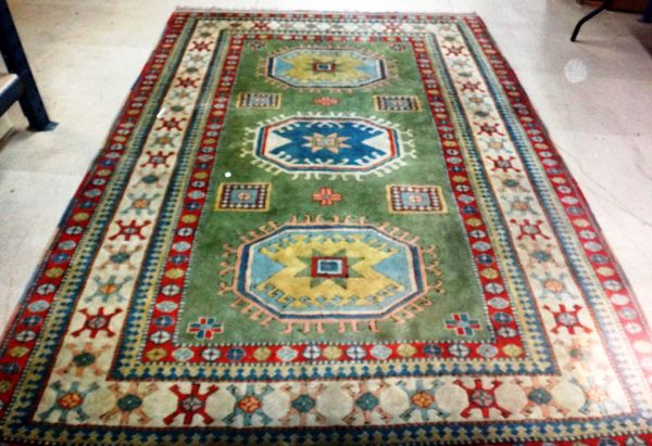 A Turkish carpet of Caucasian design, 310cm x 217cm.Property from the estates of the late Adrian Stanford and Norman St John-Stevas, Baron St John of