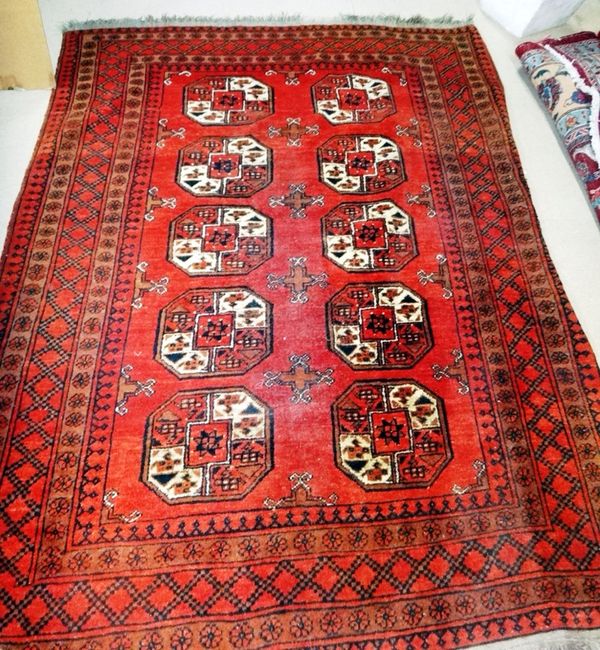 An Afghan rug, 205 x 151cm.  F7