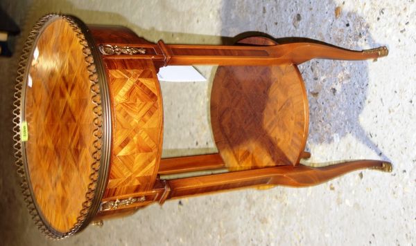A gilt metal mounted parquetry inlaid Kingwood circular two tier occasional table, 35cm wide. H5