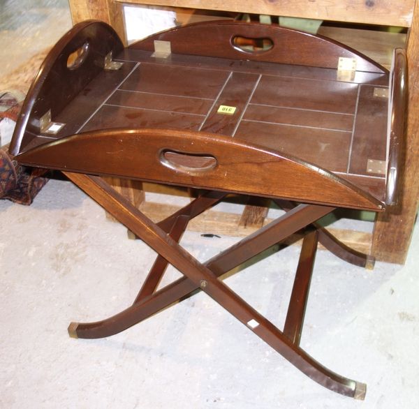 An 18th century style mahogany drop flap butler's tray, with folding stand, 64cm wide. C5