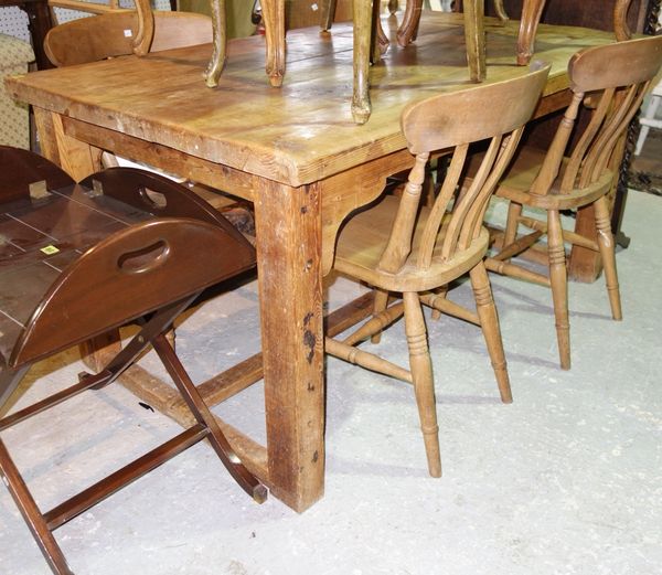 A 19th century pine farmhouse table on block supports and H-framed stretcher, 153cm wide. C6