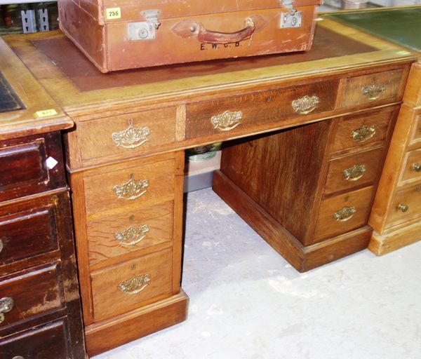 A Victorian oak pedestal desk with nine drawers about the knee, 108cm wide. GAL