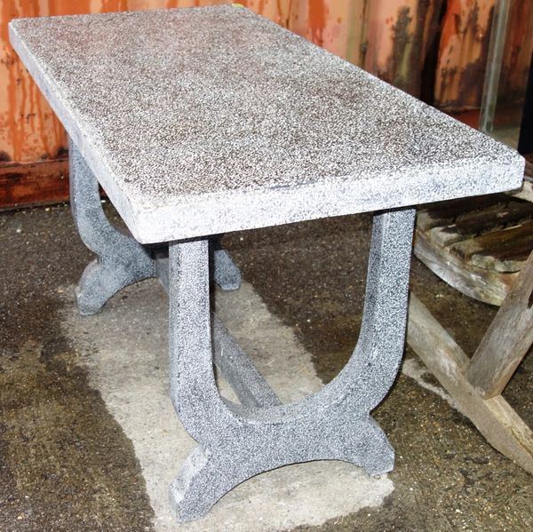 A 20th century rectangular composite garden table on trestle supports, 119cm wide x 160cm long.  OUT