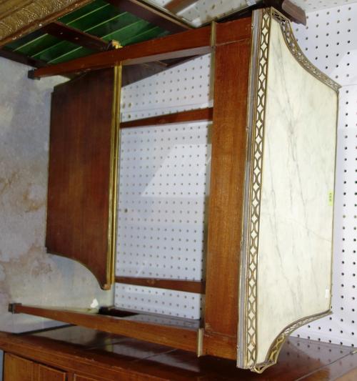 A Louis XVI style gilt metal mounted mahogany side table, the marble inset galleried top over single frieze drawer, on tapering square supports united