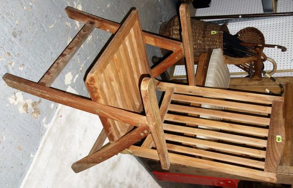 A 20th century teak folding armchair. K10