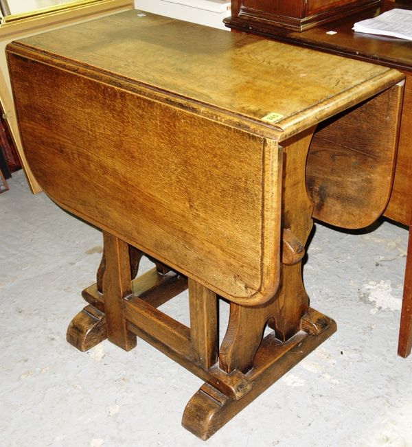 A 20th century oak drop flap dining table, 77cm wide. H2
