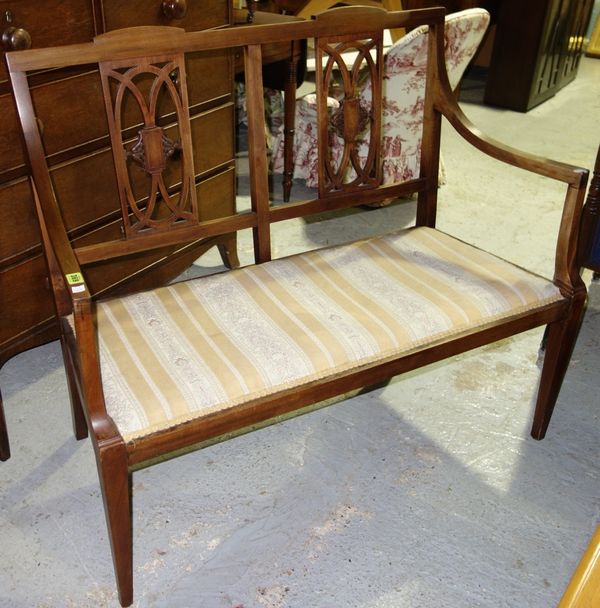 An Edwardian mahogany show frame two seat sofa, 100 cm wide.   G3