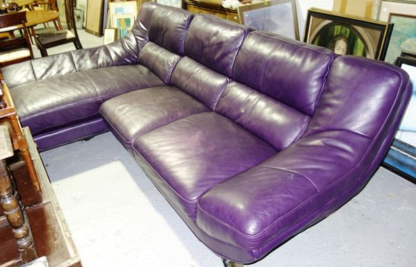 A 20th century purple leather corner sofa, 275cm wide.   B2