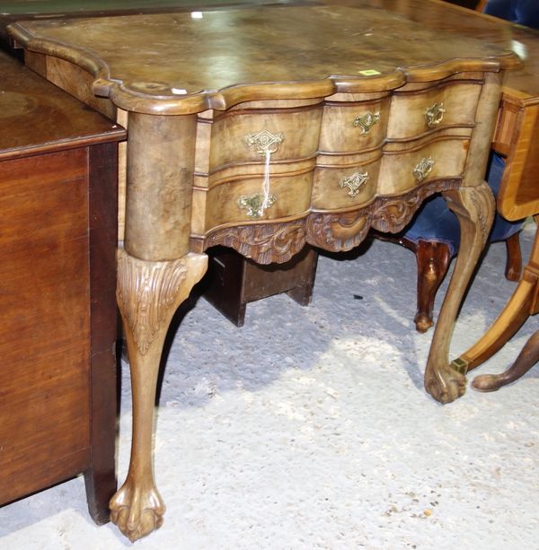 A George III style side table with ball and claw feet, 88cm wide.  H5