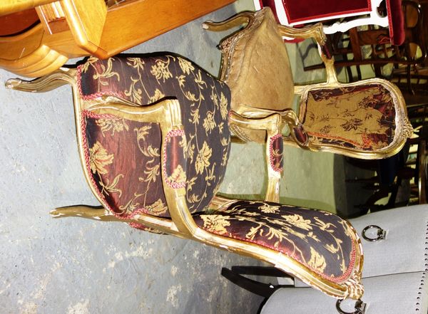 A pair of 20th century gilt framed fauteuils (2). F3