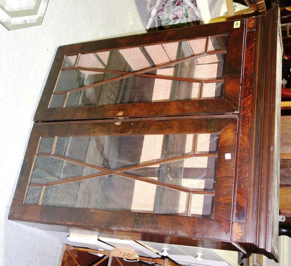 A 19th century mahogany two door glazed bookcase, 87cm wide.  I2