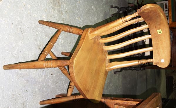 A set of four 20th century beech stick back dining chairs (4).  C6