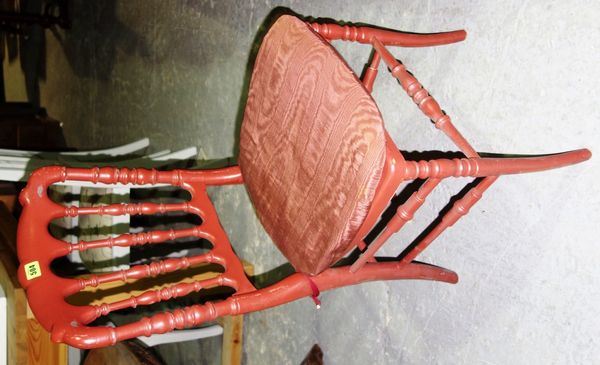 A set of twenty four red painted resin 20th century spindle back chairs.  F4