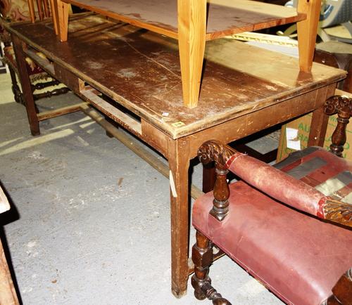 A 19th century and later French pine plank top kitchen table, 78cm wide x 170cm long.  K4
