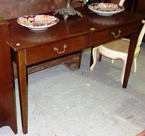 A 20th century mahogany two drawer side table, 122cm wide.  DIS