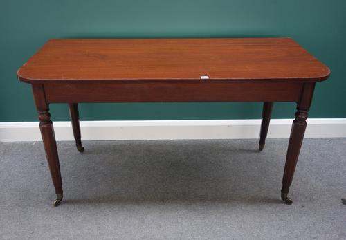 A pair of 19th century mahogany console tables, each with rounded rectangular top on tapering octagonal supports, 137cm wide, (2).  DIS
