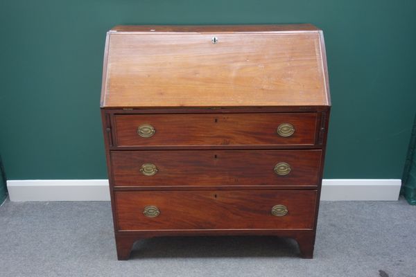 A George III mahogany bureau, the fall enclosing a fitted interior, over three long drawers, on bracket feet, 100cm wide.   DIS