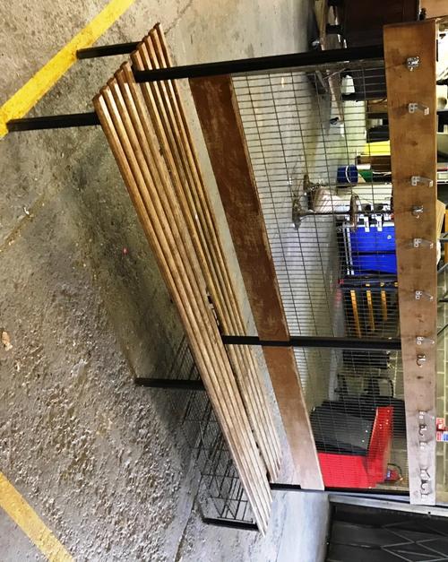 A 20th century double sided cloakroom bench with hanging rail.  EXTRA