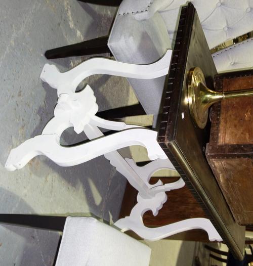 A rectangular walnut dining table with white painted base, 130cm wide. E3