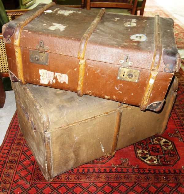 An early 20th century wooden bound canvas trunk and another. (2) F7